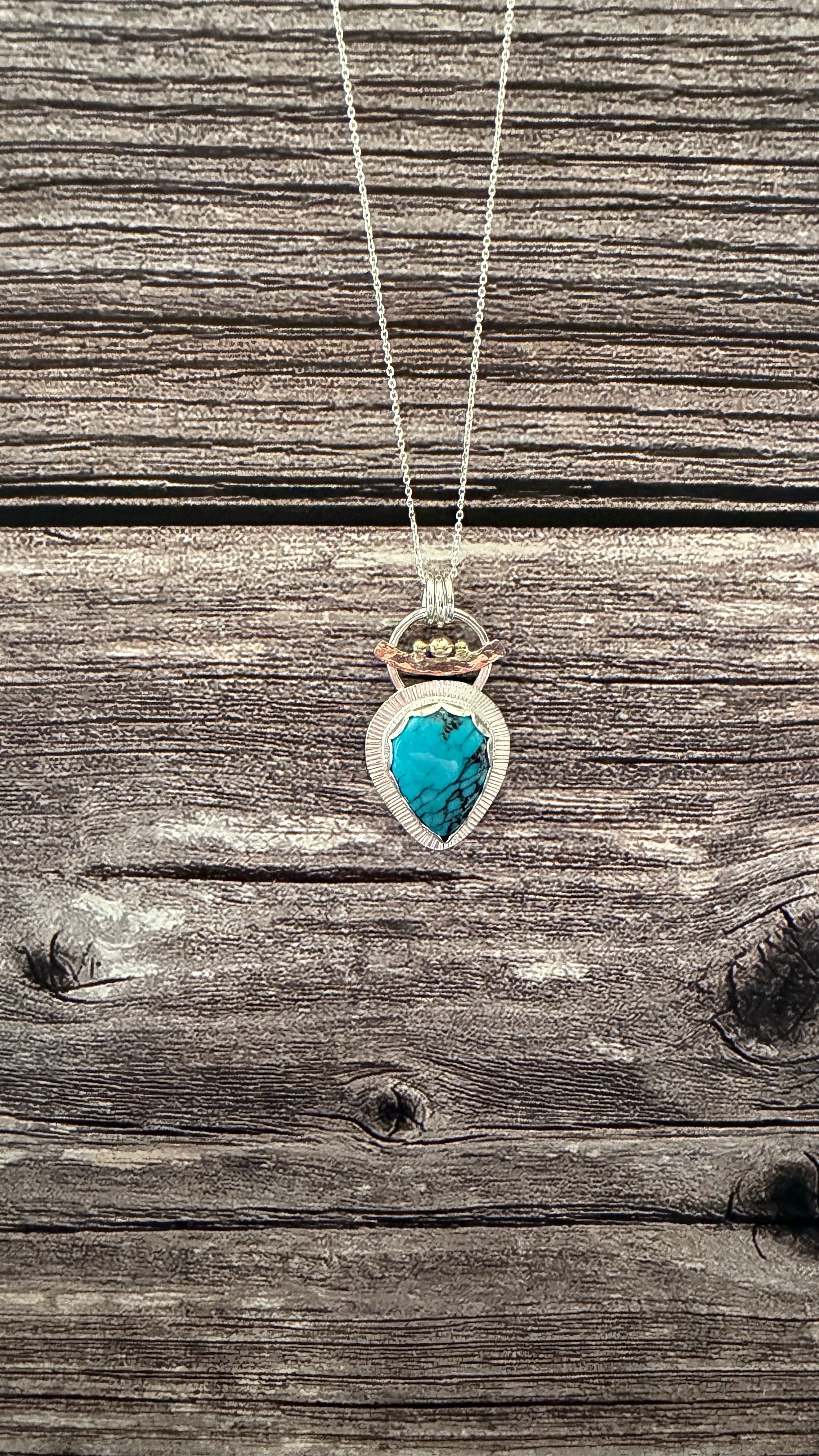 Turquoise drop necklace with 9ct Gold detailing.