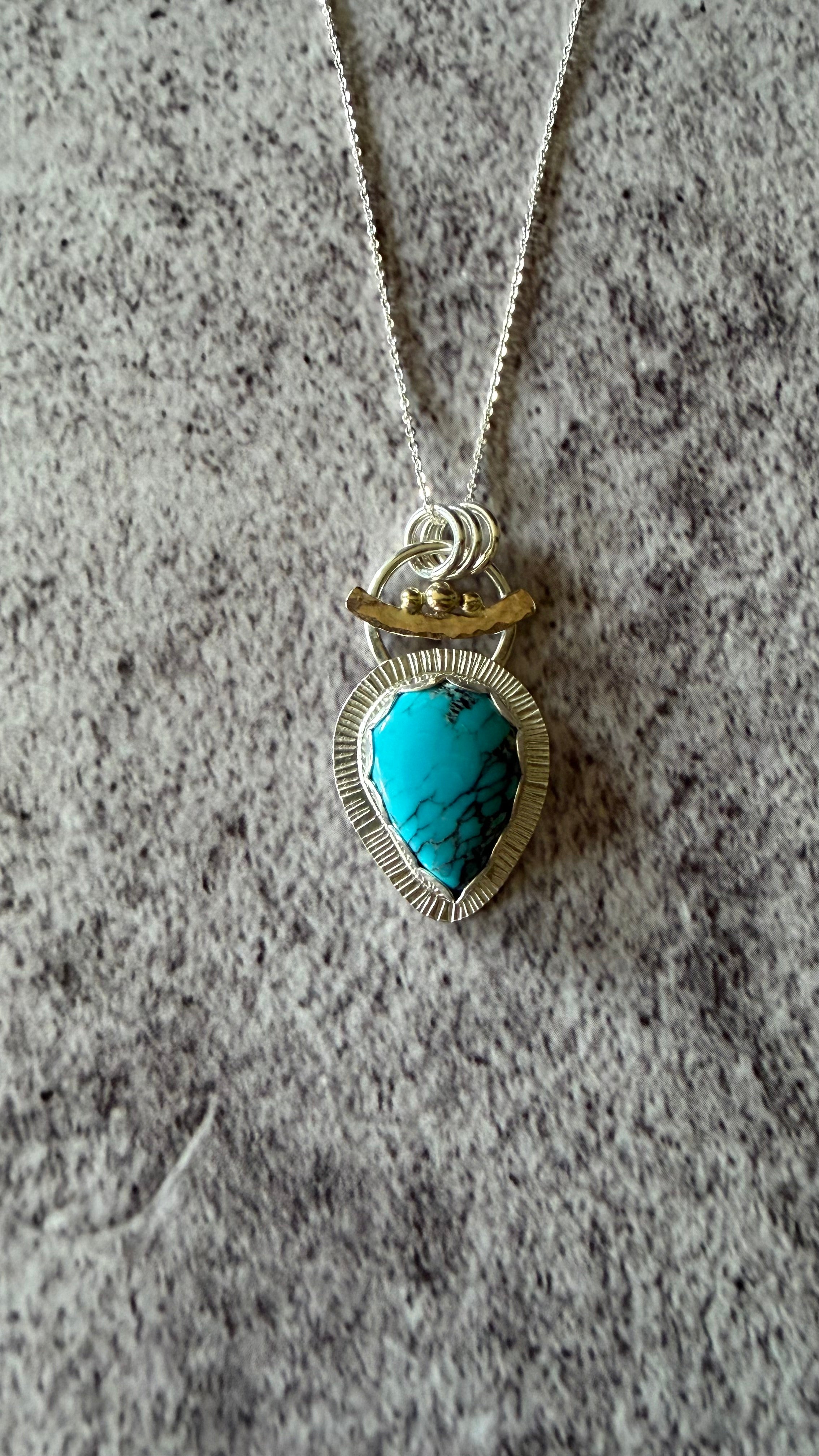Turquoise drop necklace with 9ct Gold detailing.