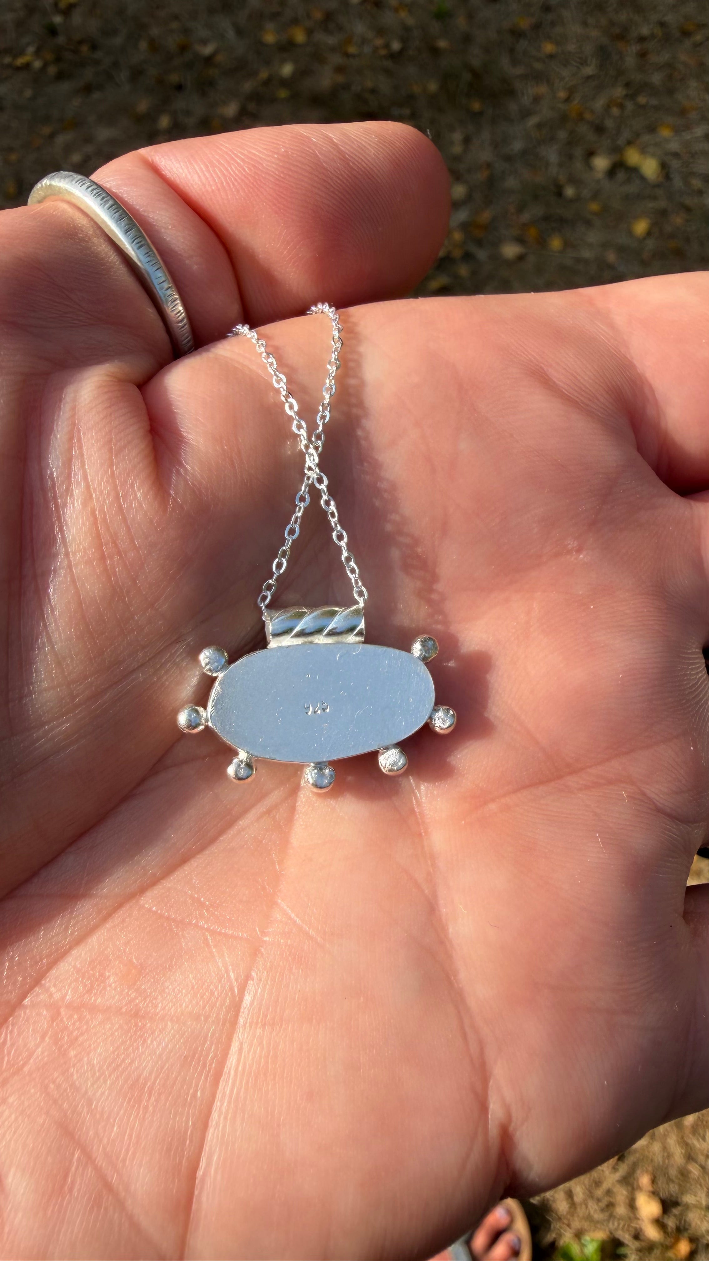 Green Moss Kyanite pendant set in sterling silver.