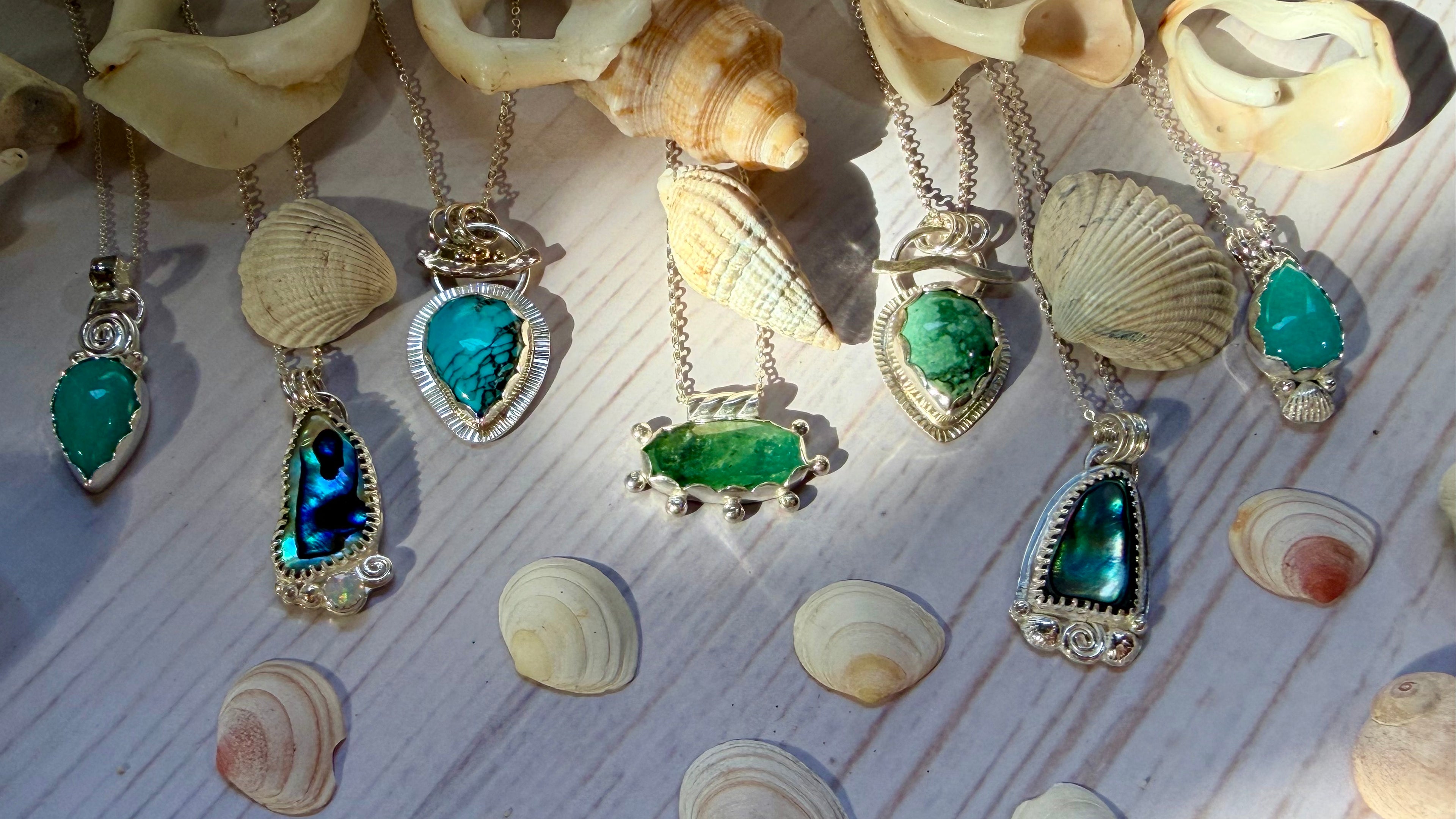 Green Moss Kyanite pendant set in sterling silver.